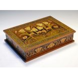 Early 20th Century Arts & Crafts carved and painted wooden desk box, the hinged rectangular cover