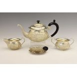 20th Century Indian white metal three piece tea set, with matching tea strainer and dish, each piece