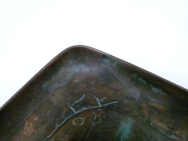 Newlyn copper chamber candlestick, having embossed decoration of two stylised fish and stamped - Image 9 of 9