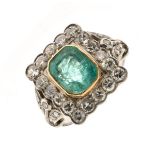 Emerald and diamond cluster ring, unmarked, the step cut emerald approximately 8mm x 6.2mm x 4.3mm