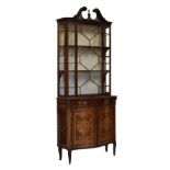 Good quality early 20th Century mahogany and marquetry serpentine display cabinet, the upper stage