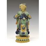 19th Century Chinese sancai pottery figure of Guanyin/Kwanyin, with floral hair ornaments and