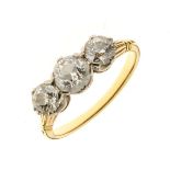 Three stone diamond ring, unmarked yellow mount, the graduated old brilliant cuts totalling
