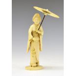 Japanese Meiji period carved ivory okimono, of a Geisha or Bijin, holding a parasol and a bunch of