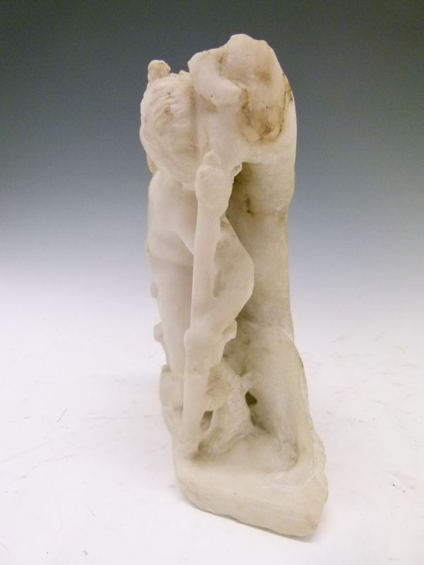 Antiquities - Carved white marble figure of Eros, modelled in standing pose holding a staff in his - Image 3 of 9