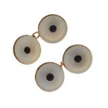 Pair of mother-of-pearl cufflinks, centred with a blue cabochon, stamped '9ct', 5.8g gross