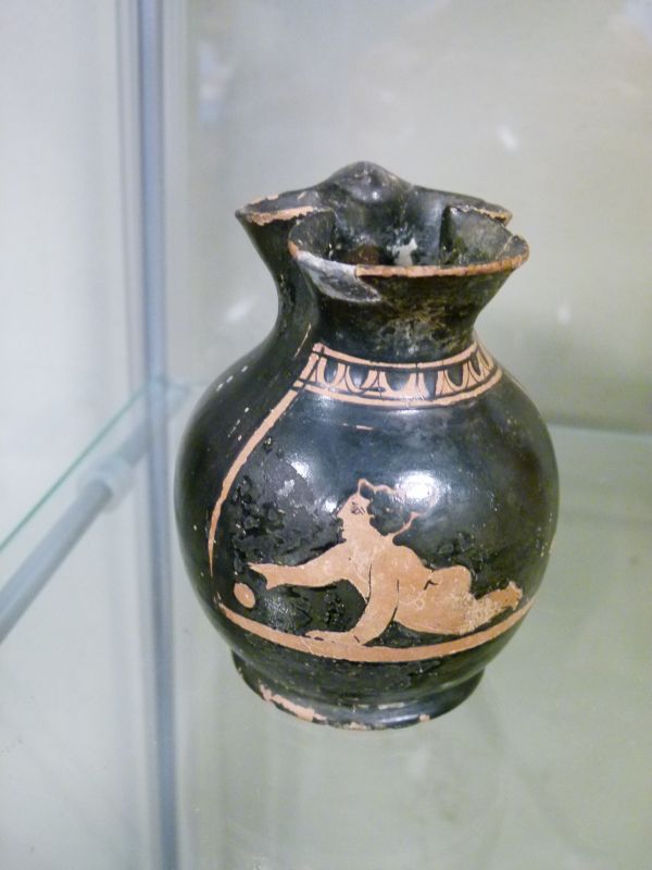 Antiquities - Four items of pottery comprising a glazed terracotta bottle vase of tapering slender - Image 2 of 6