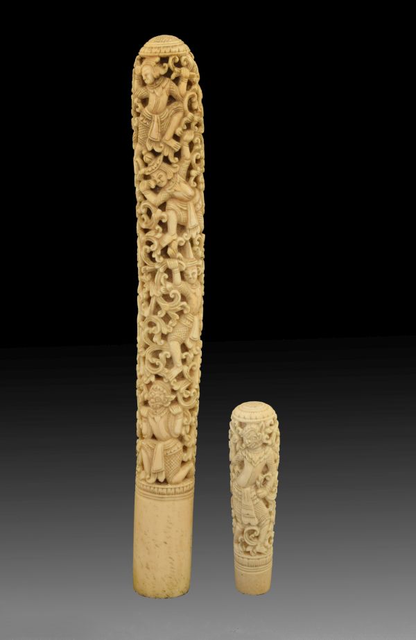 Two 19th Century Indian carved ivory handles, the longer possibly from a sword or staff, the shorter