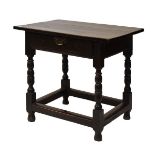 18th Century oak side table, the over hanging two-piece rectangular to over frieze drawer with brass