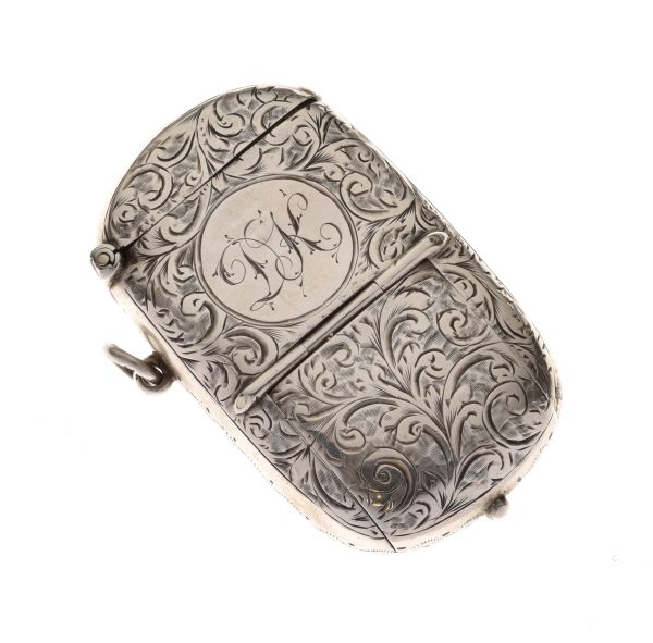 Victorian silver vesta case with integral stamp and sovereign holder, having allover engraved floral