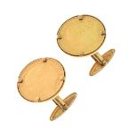 Pair of sovereign cufflinks, each of the 9ct gold mounts set with an 1884 sovereign, 22.7g gross