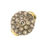 Twenty-one stone diamond 18ct gold cluster ring, the old brilliant cuts totalling approximately 1.