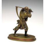 19th Century cast bronze figure of Father Time, the winged figure standing holding a scythe, on oval