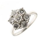 Seven stone diamond 18ct white gold cluster ring, the central brilliant cut of approximately 0.25