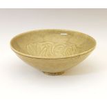 Chinese celadon-glazed crackleware pottery bowl, the interior decorated with a figure amidst