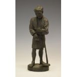 Japanese Meiji period bronze figure, of a farmer, traces of red painted mark beneath, 33cm high