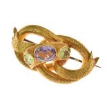 Victorian amethyst and peridot three stone brooch, in unmarked yellow metal, the double oval and