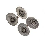 Pair of Royal Marine Regimental cufflinks, stamped 'Silver', the oval panel with applied