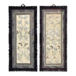 Two Chinese embroidered silk sleeve panels, one depicting butterflies amongst foliage with central