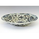 Large early 20th Century Japanese porcelain dish, of wavy-edged form, the interior decorated with