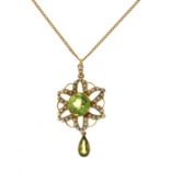 Edwardian peridot and seed pearl pendant, on a chain, the 9mm diameter central peridot to a seed