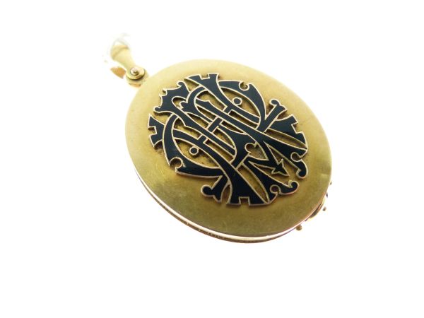 Victorian gold locket, with applied black enamel monogram, swing open action, containing a - Image 3 of 7