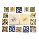 Collection of sixteen mainly 18th and 19th Century Continental faience tiles, largest 20cm square