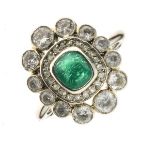 Emerald and diamond platinum cluster ring, the rectangular mixed cut emerald approximately 5mm x 4.