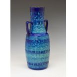 Scheurich two handled pottery vase, the entire surface decorated with relief moulded horizontal