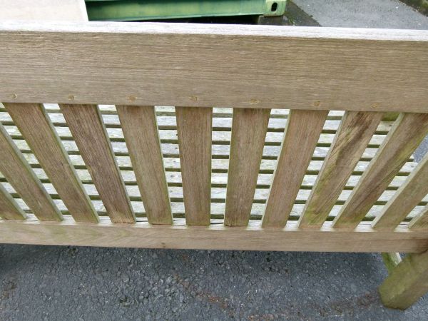 Mid 20th Century weathered teak garden bench, the back rail carved with verses from 'God's Garden' - Image 5 of 9