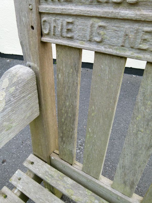 Mid 20th Century weathered teak garden bench, the back rail carved with verses from 'God's Garden' - Image 2 of 9