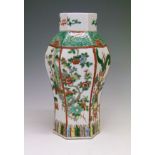 19th Century Chinese Canton Famille Verte porcelain hexagonal baluster vase, decorated with panels