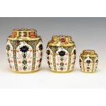 Graduated group of three Royal Crown Derby porcelain 'Old Imari' ginger jars and covers, pattern