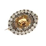 Late Victorian citrine and diamond oval brooch, the step cut quartz approximately 15.6mm x 13.5mm
