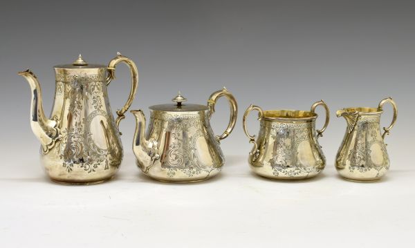 Victorian four piece silver tea set, of bulbous form with engraved decoration, London 1874, sponsors
