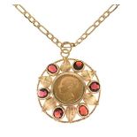 1866 shield back sovereign, in a 9ct gold garnet set pendant, on a 9ct gold chain, pendant 4.5cm
