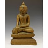 Antique South East Asian (Burmese or Thai) giltwood figure of the Buddha, with hands in Bhumisparsha