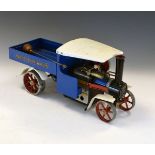 Mamod SW1 steam waggon with a blue and cream body, with rod