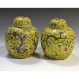 Two 20th Century Chinese ginger jars, each with yellow ground, 15.5cm high