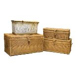 Graduated set of three woven seagrass trunks, largest 85cm wide x 44cm deep x 44cm high, together