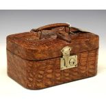 Vintage crocodile skin vanity or travel case, the red plush interior with mirror and removable