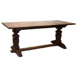 Good quality reproduction oak refectory style dining table having four plank top, raised on carved