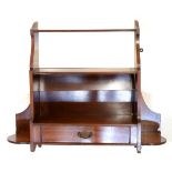 Set of late 19th Century walnut wall hanging shelves with drawer below, 74cm wide