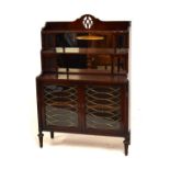 Reproduction mahogany Regency style chiffonier having mirror back with two shelves and a pair of