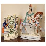 Two Victorian Staffordshire pottery figures comprising: a flatback equestrian figure of a mounted