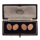 Cased pair of 9ct gold cufflinks of oval design, 5.6g gross approx