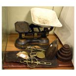 Set of early 20th Century grocer's scales with weights, together with a brass and leather martingale