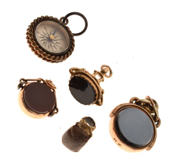 Group of five gold, yellow metal and unmarked fobs, to include; two bloodstone and carnelian