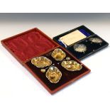 Cased set of four Edward VII silver salts and spoons, Birmingham 1906, together with a cased set