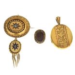 Three various unmarked yellow metal lockets, the first with glazed back and enamelled tasselled